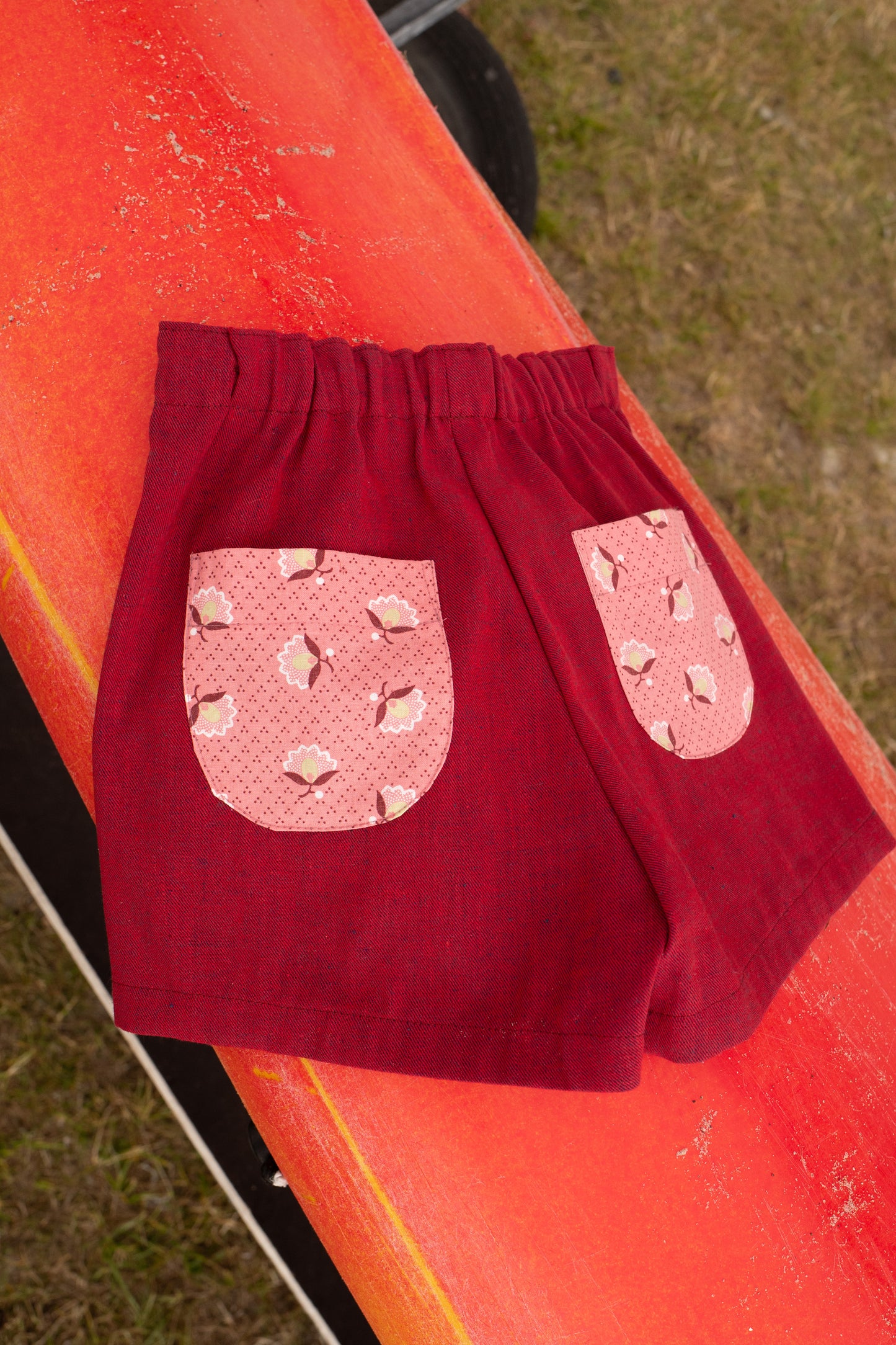 BOBBIE SHORTS, VINTAGE RED DENIM, PINK FLOWER POCKETS